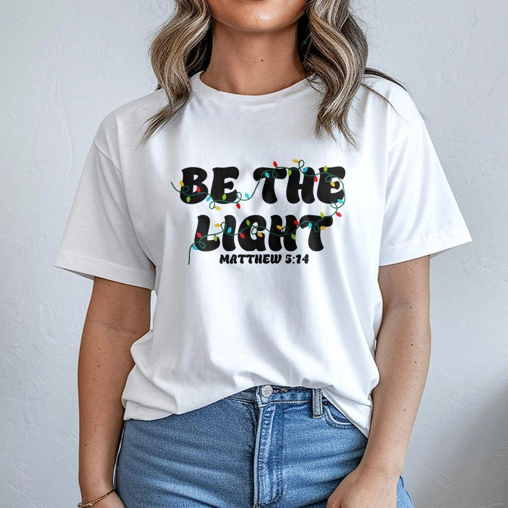 Bible Verse Christmas Shirt, Be the Light Matthew 5:14 T-Shirt, Christian Faith Graphic Tee, Scripture Holiday T-Shirt, Faith