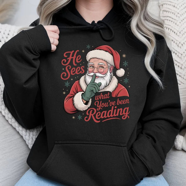 Humorous Bookworm Santa Hooded Sweatshirt, He Sees What You've Been Reading Hoodie, Christmas Book Lover Hoodie, Holiday Read