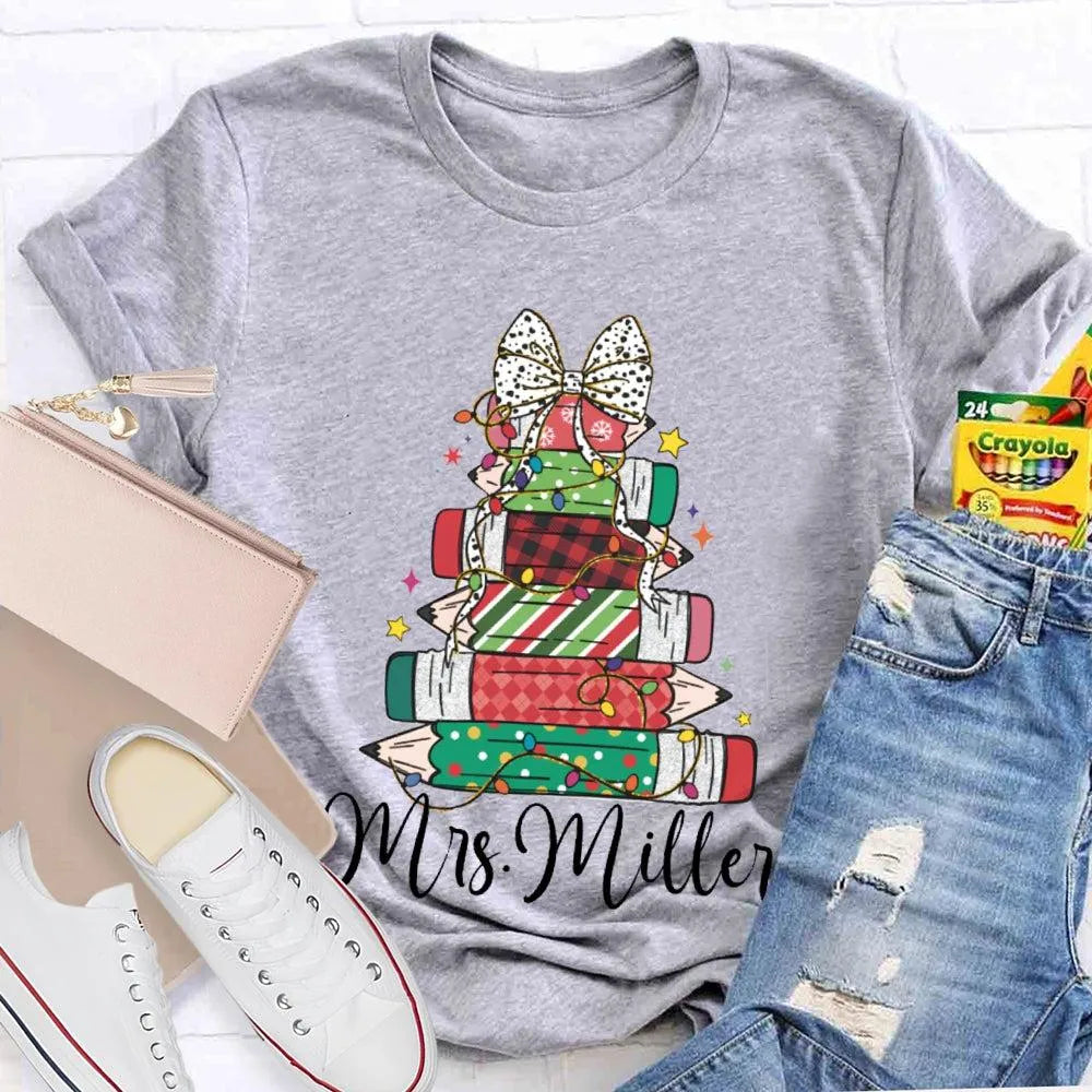 Colorful Crayons Bows Holiday Shirt, Personalized Christmas T-Shirt, Custom Name Kids Xmas Graphic Tee, Festive School Party 