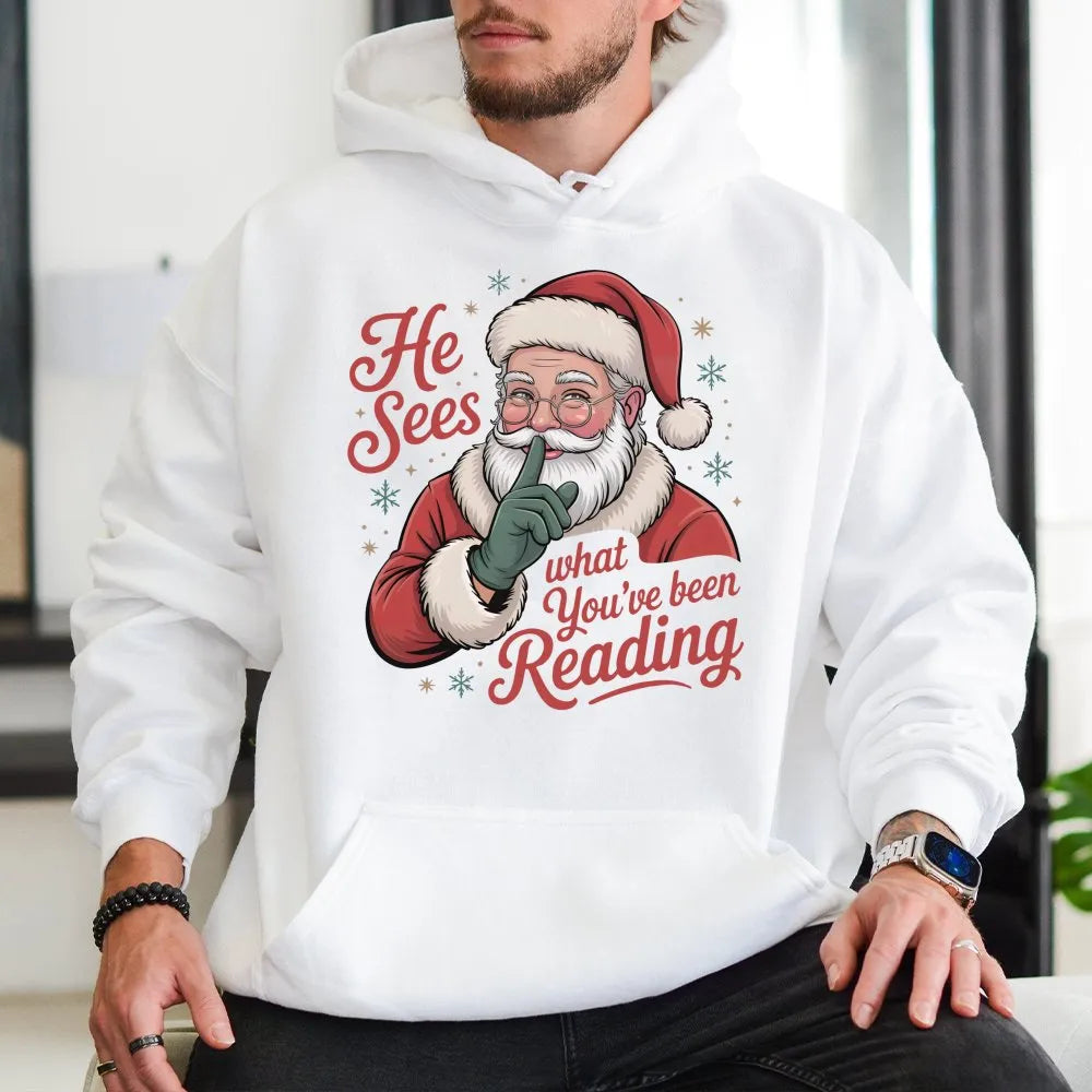 Humorous Bookworm Santa Hooded Sweatshirt, He Sees What You've Been Reading Hoodie, Christmas Book Lover Hoodie, Holiday Read