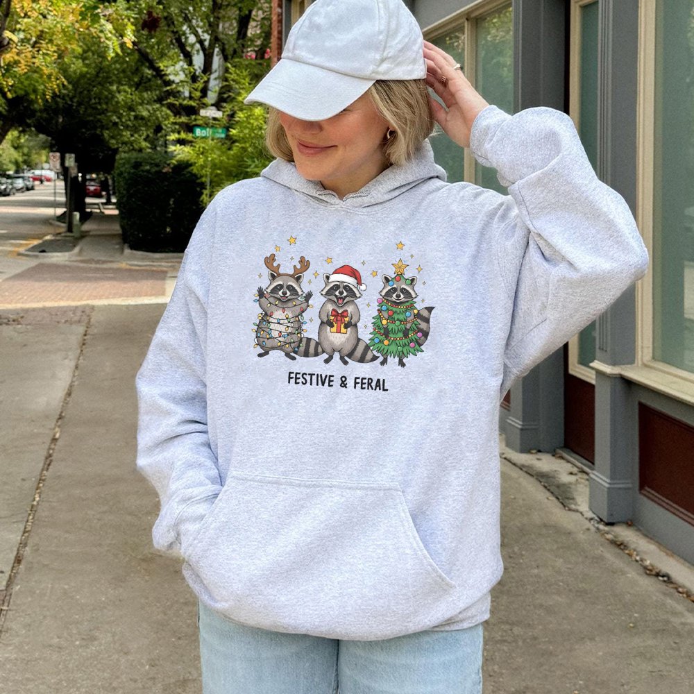 Humorous Christmas Animal Hoodie, Festive and Feral Raccoon Hoodie, Adorable Trash Panda Holiday Sweatshirt, Retro Raccoon Xm