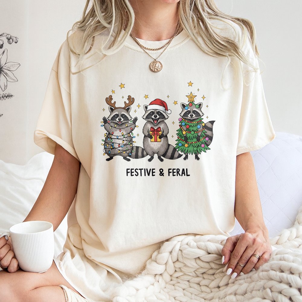 Humorous Christmas Animal T-Shirt, Festive and Feral Raccoon T-Shirt, Retro Holiday Graphic Tee, Adorable Xmas Trash Panda Gr