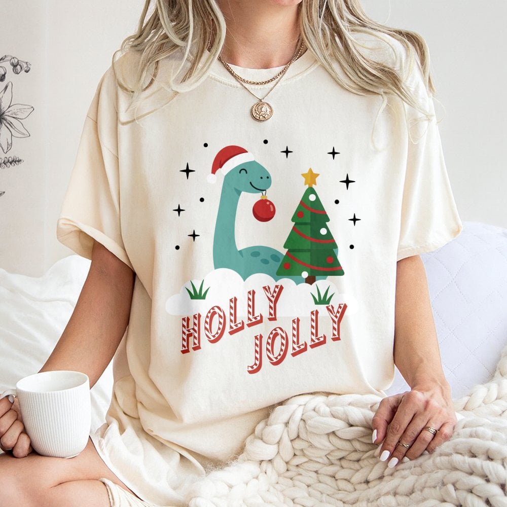 Adorable Festive Dino T-Shirt, Holly Jolly Dinosaur Christmas Shirt, Retro Holiday Dinosaur Graphic Tee, Xmas Dino Shirt, Fam