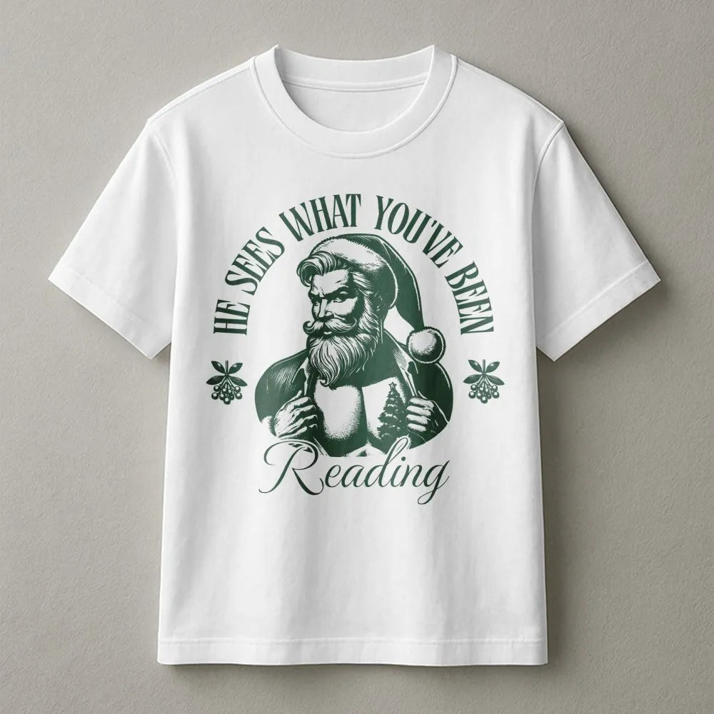 Humorous Santa Book Lover T-Shirt, He Sees What You've Been Reading T-Shirt, Bookish Christmas Shirt, Holiday Reader Graphic 