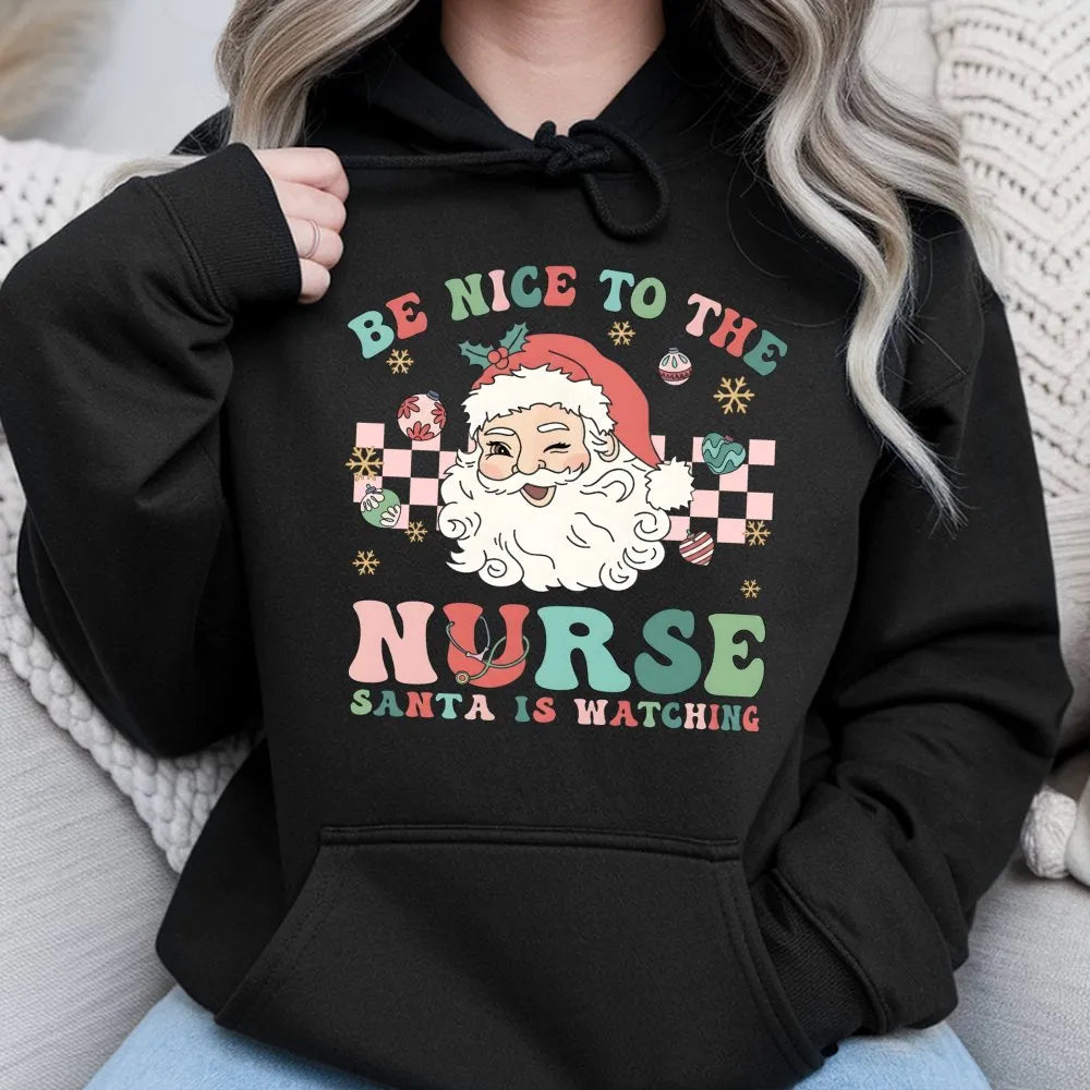 Be Nice to the Nurse Santa Is Watching Hoodie, Nurse Christmas Hoodie, Humorous RN Holiday Sweatshirt, Nurse Christmas Pullov