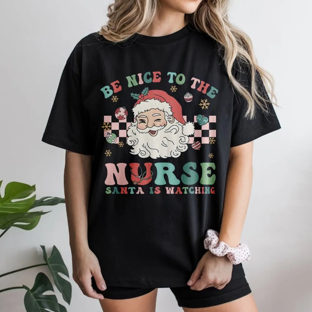 Humorous Nurse Christmas T-Shirt, Be Nice to the Nurse Santa Is Watching Shirt, RN Holiday Graphic Tee, Healthcare Xmas Shirt
