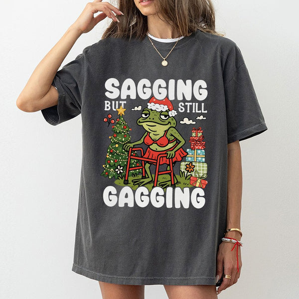 Humorous Frog Christmas Tee, Sagging but Still Gagging T-Shirt, Sarcastic Adult Humor Shirt, Adorable Holiday Frog Graphic Te