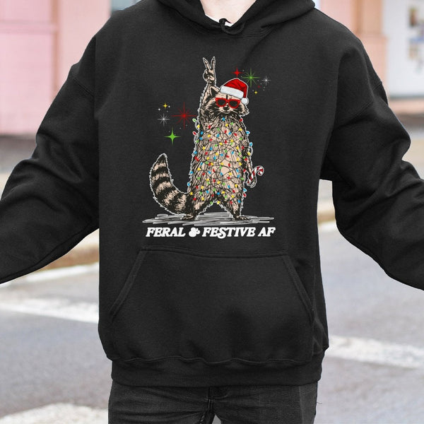 Tangled Christmas Lights Hoodie, Feral and Festive Raccoon Hoodie, Humorous Holiday Animal Pullover Hoodie, Retro Xmas Sweats