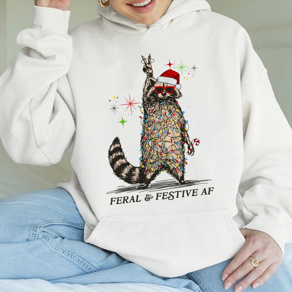 Tangled Christmas Lights Hoodie, Feral and Festive Raccoon Hoodie, Humorous Holiday Animal Pullover Hoodie, Retro Xmas Sweats